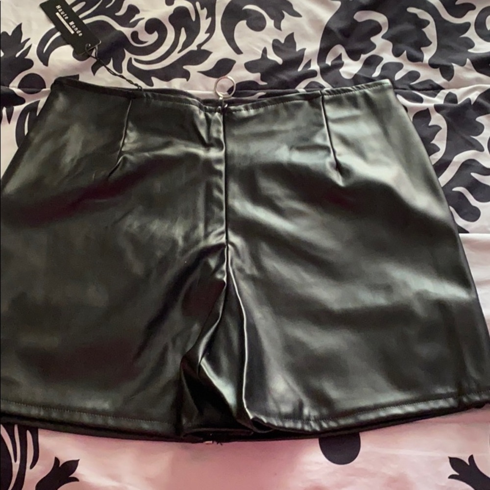 A black leather skort